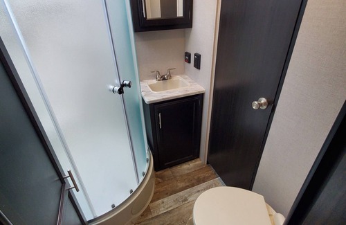 Eustis House | 27ft Nightly Rental RV in Sylvester Farm Campground and Cabins.