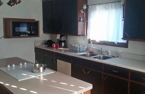 Ellis Historical District House | 2BR, 1.5BA, Pet-friendly, Lower duplex w/finished basement + large backyard!