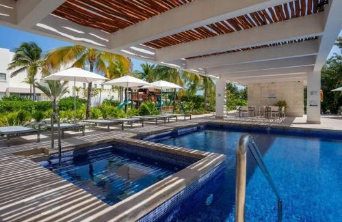Playa Mujeres Apartment | 2BR Beachfront Exclusive Condo w/Top Features