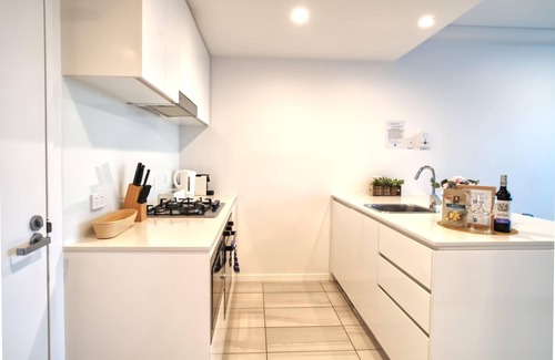 Newstead Apartment | 2BR Food Drink Hub Gym Pool Views Roof Terrace