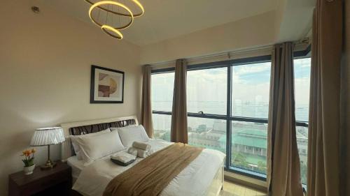 Ermita Apartment | 2BR Grand Riviera Suites by MrSayla