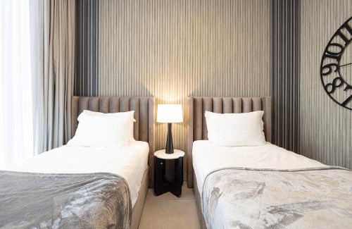 Sharjah Apartment | 2BR The Al Jada Dream by Blue Cloud Holidays