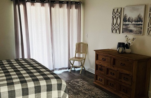 Eden Isle Condo | 2nd floor condo with view of lake and 4th hole on the Red Apple Inn Golf course.