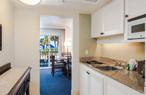 Brightwater Hotel | 2xTropical View Villa w/Balcony 2 Queen Beds Room at Island Grand at TradeWinds