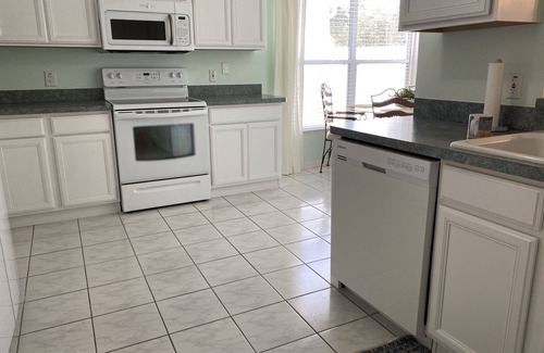 Belle Aire Villa | 3 bed 2 bath, 1500 sf, ct yard villa, private heated pool and 4 person golf cart