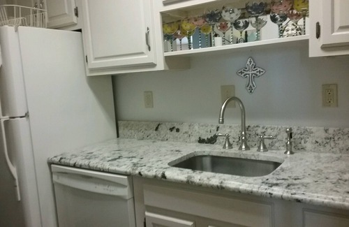 Faubourg Livaudais Condo | 3 Bed 2 Bath On St Charles With 2 Parking Spaces Across From Street Car Stop