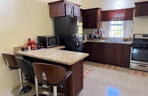 Falmouth House | 3-bedroom bungalow located in the Gated Community of Stonebrook Manor