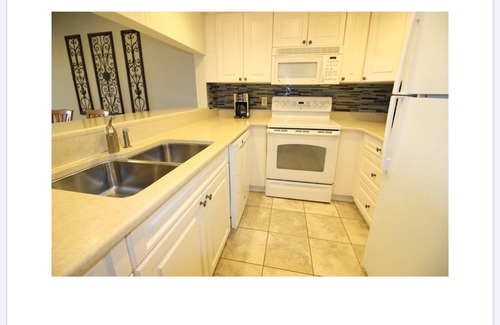 Shelter Cove Condo | 3 BEDROOM CONDO with spectacular harbor views and heated pool/hot tub