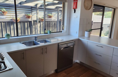Maloneys Beach House | 3 bedroom home in walking distance to the beach and south coast walking track.