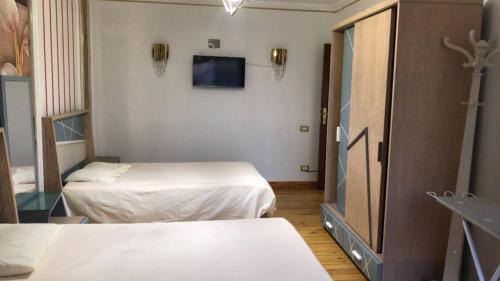 Al Duqqi Apartment | 3-bedroom hotel apartment in Dokki, a distinctive accommodation, minutes to Zamalek