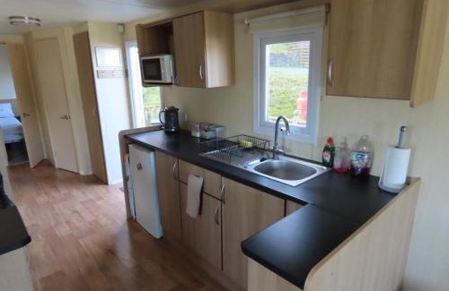Aberystwyth House | 3 bedroom static caravan with sea view in Clarach Bay Holiday Village Abi horizon