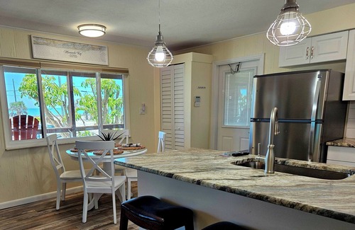Englewood House | 30 Seconds To Beach Path! Tiki Bar with outdoor TV! Bikes, Kayaks, Sups & more!