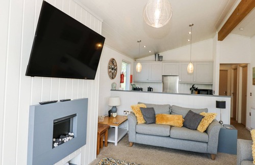 Rhyd-y-clafdy Cottage | 32 SANCTUARY LODGE, pet friendly, with pool in Y Ffor