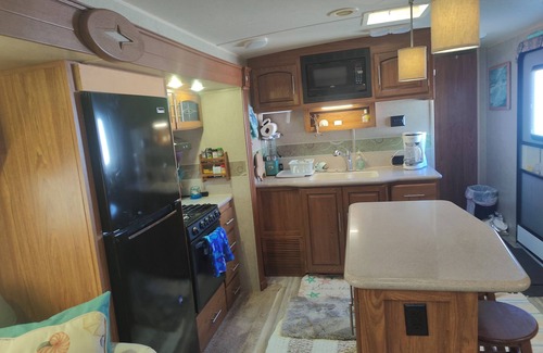 North Topsail Beach House | 35 ft RV, large deck, intercoastal sunset, campground across street from ocean