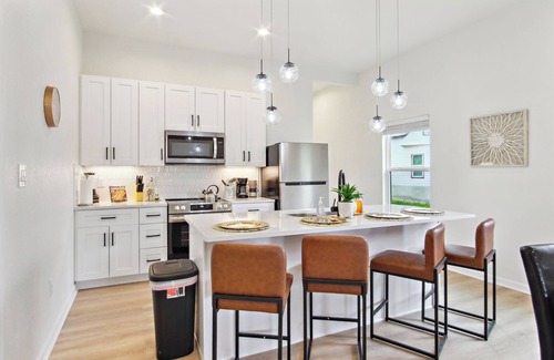 Near East Side Apartment | 3br-2ba Cityscape Haven With Panoramic Tower View!