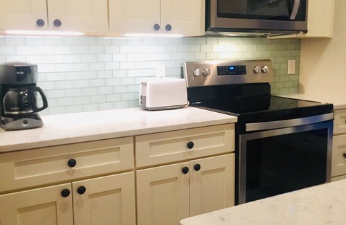 Maple City Condo | 3BR Beachfront Homestead Condo. Great Beach. Amazing Sunsets. Directly on Lake