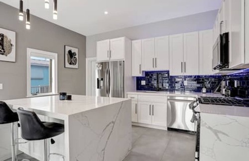 South New River Isles House | 3BR Waterfront Villa with Heated Pool, Spa, & Rooftop Deck