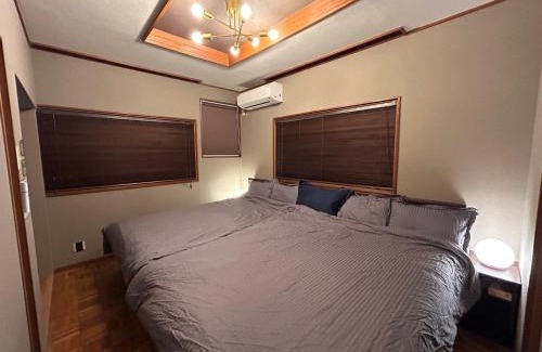 Minato House | 3LDK Entire house for rent 3 bedrooms, 2 toilets, and parking lot! Close to the station, USJ, and Expo!
