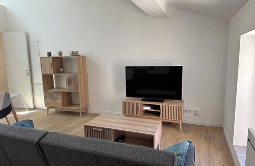 Sauxillanges Apartment | 4-bed family apartment with hanging net and arcade terminal