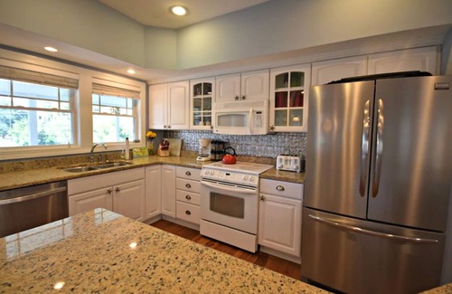 North Litchfield Beach House | 4 Bedroom, 4 Bath Raised Beach House 3 Blocks From the Beach! Golf Cart Included