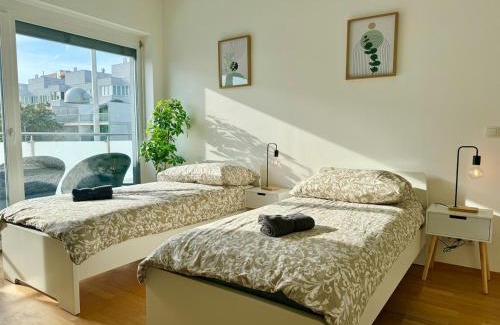 Liesing Apartment | 4 Bedroom Apartment with Balcony, AC & Free Parking