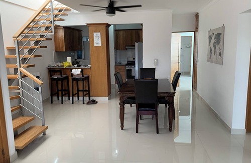 Santo Domingo Condo | 4-bedroom condo Steps from Ocean w/Pier, parking, WiFi, AC, parks & shopping.
