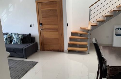 Santo Domingo Condo | 4-bedroom condo Steps from Ocean w/Pier, parking, WiFi, AC, parks & shopping.