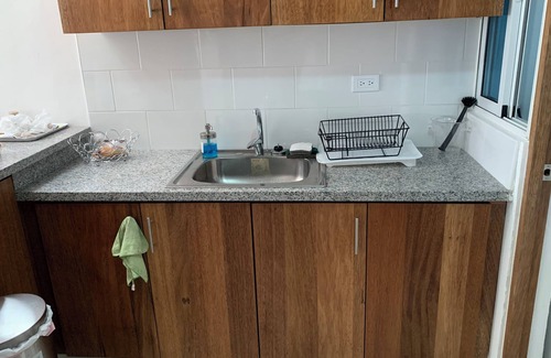 Santo Domingo Condo | 4-bedroom condo Steps from Ocean w/Pier, parking, WiFi, AC, parks & shopping.