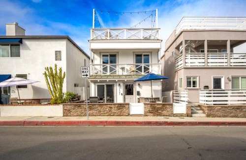 West Newport House | 4 Bedroom Home with Rooftop & Peek-A-Boo Ocean View