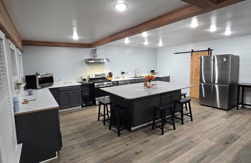 Golden Meadow Cabin | 4-bedroom lodge with waterside access and a great balcony view. Enjoy your stay