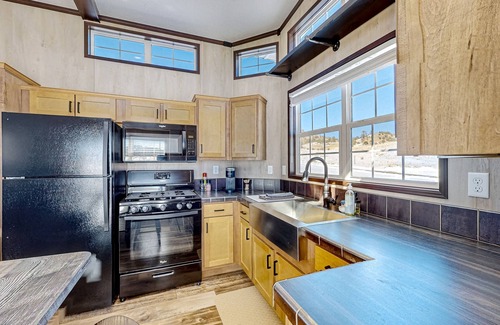 Fremont County Cottage | 4 cabins on an 1800-acre working ranch with amazing views & animals