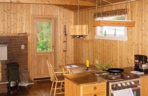 Vinnes House | 4 person holiday home in Reksteren