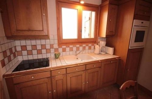 Bisanne 1500 Apartment | 4-room mezzanine apartment with balcony, fully equipped, pets allowed, covered parking.