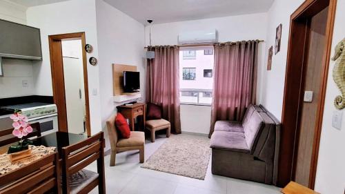 Tramandai Apartment | 400m da Praia II 1,7km Congresso Est Catolica 2025 ll Wi Fi 750 Mpbs ll Churrasqueira ll 2ºAndar Elevador ll Ar Condicionado ll Maquina de Lavar ll Vaga Para Carro ll Guarda Sol l Cadeiras de Praia