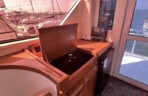 Tampa Boat Rental | 48’ Hattaras Sport Yacht onTreasure Island inter coastal near johns pass village