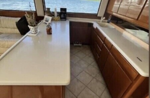 Tampa Boat Rental | 48’ Hattaras Sport Yacht onTreasure Island inter coastal near johns pass village
