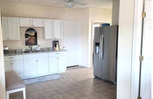 Gravois Mills House | 4BR 4BA lake front w/Dock & Kayak across Coconuts