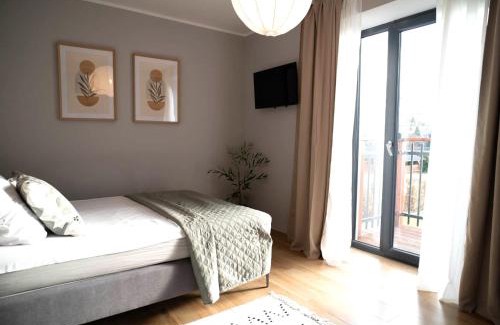 Ilawa Apartment | 4jeziora - prywatny dostęp do rzeki, pomost, ogrodem, wiata grillowa, rowerek wodny, kajaki w cenie, parking, psiaki dozwolone