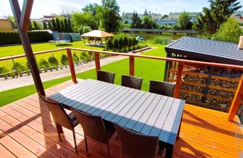 Ilawa Apartment | 4jeziora - prywatny dostęp do rzeki, pomost, ogrodem, wiata grillowa, rowerek wodny, kajaki w cenie, parking, psiaki dozwolone