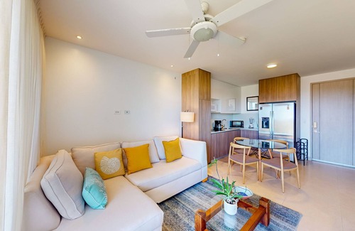 Jaco Apartment | 4th-floor condo with water view, on-site pool, private balcony, & W/D