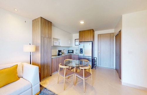 Jaco Apartment | 4th-floor condo with water view, on-site pool, private balcony, & W/D