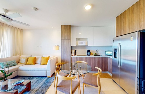 Jaco Apartment | 4th-floor condo with water view, on-site pool, private balcony, & W/D