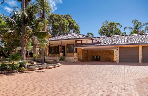 Greenfields House | 5 Bedroom home with an amazing back yard including a pool and large Koi ponds