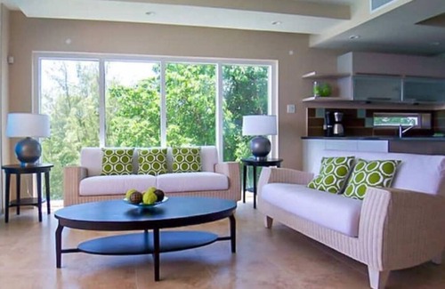 Maxwell Condo | 501 Ocean front condo at Ocean One Maxwell coast road Barbados