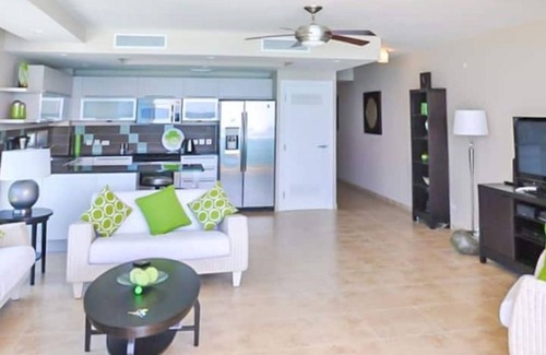 Maxwell Condo | 501 Ocean front condo at Ocean One Maxwell coast road Barbados