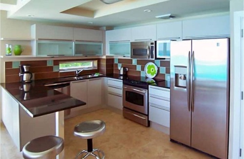 Maxwell Condo | 501 Ocean front condo at Ocean One Maxwell coast road Barbados