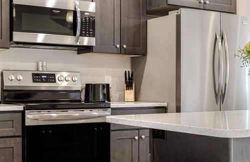 Traverse City Condo | ♛ 539 Bay St ⁀➷ Luxury Downtown 2BDR Lake View Penthouse Condo steps to Beach!