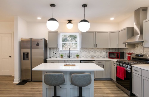 Weinland Park House | 5th Street Retreat! Centrally located family-sized home with game room & deck