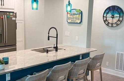 Siesta Key Condo | 6057 EPW Enjoy Tranquil Waterfront Relaxation