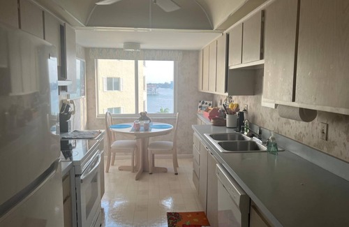 Moorings Condo | 6th Floor Condo with stunning bay views and 3 minute walk to the beach.
